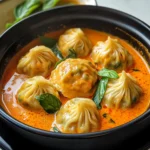 Soup Dumplings in Thai Red Curry Sauce